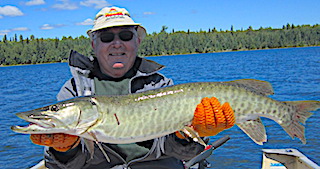Great Muskie and Great Photo Fishing at Fireside Lodge in Canada  